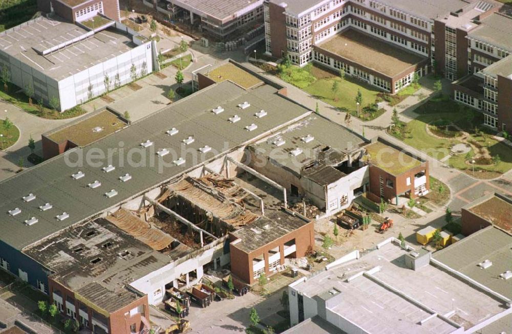 Aerial photograph Berlin - Hellersdorf - Brandschaden im Gewerbegebiet Mahlsdorf / Hellersdorf an der B1.