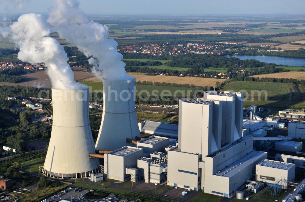 Lippendorf from above - Gelände des Kraftwerk Lippendorf, ein mit Braunkohle befeuertes Heizkraftwerk / Dampfkraftwerk im Nordwestrand des Ortes Lippendorf der Gemeinde Neukieritzsch im Landkreis Leipzig. Die beiden Dampferzeuger und Kesselhäuser sind knapp 165 Meter hoch. Betreiber und neben der EnBW Energie Baden-Württemberg AG auch Eigentümer des Kraftwerks ist die Vattenfall Europe Generation AG. Area of fueled by brown coal power plant Lippendorf in municipality Neukieritzsch in administrative district Leipzig. The two steam generators and boiler houses are nearly 165 metres high. The heat and steam power plant is owned by power supply companies EnBW Energie Baden-Württemberg and Vattenfall Europe Generation AG, who is also the operator.