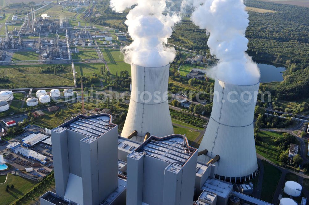 Aerial photograph Lippendorf - Gelände des Kraftwerk Lippendorf, ein mit Braunkohle befeuertes Heizkraftwerk / Dampfkraftwerk im Nordwestrand des Ortes Lippendorf der Gemeinde Neukieritzsch im Landkreis Leipzig. Die beiden Dampferzeuger und Kesselhäuser sind knapp 165 Meter hoch. Betreiber und neben der EnBW Energie Baden-Württemberg AG auch Eigentümer des Kraftwerks ist die Vattenfall Europe Generation AG. Area of fueled by brown coal power plant Lippendorf in municipality Neukieritzsch in administrative district Leipzig. The two steam generators and boiler houses are nearly 165 metres high. The heat and steam power plant is owned by power supply companies EnBW Energie Baden-Württemberg and Vattenfall Europe Generation AG, who is also the operator.