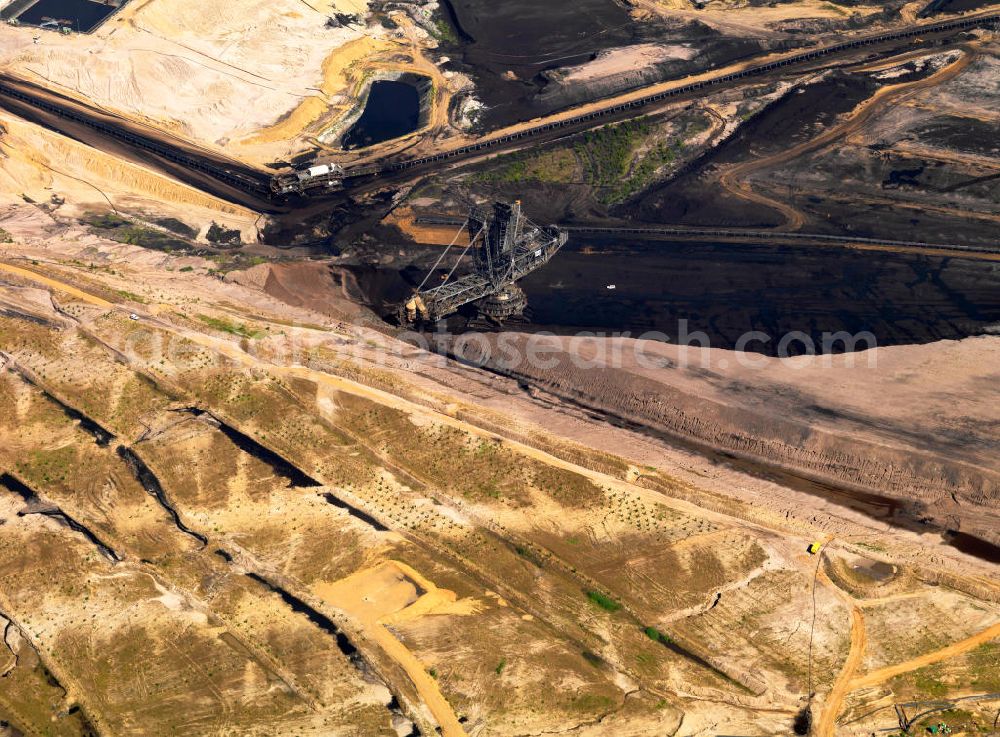 Aerial image Niederzier - Der Braunkohle- Tagebau Hambach (in den Gemeinden Niederzier, Kreis Düren und Elsdorf, Rhein-Erft-Kreis) ist der größte von der RWE Power AG (ehemals Rheinbraun AG) zur Förderung von Braunkohle betriebene Tagebau. Hambach coal- mine in North Rhine-Westphalia