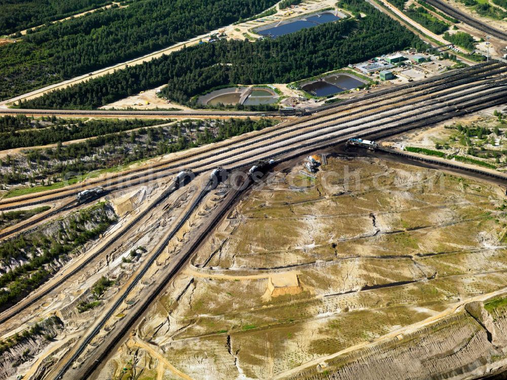 Aerial photograph Niederzier - Der Braunkohle- Tagebau Hambach (in den Gemeinden Niederzier, Kreis Düren und Elsdorf, Rhein-Erft-Kreis) ist der größte von der RWE Power AG (ehemals Rheinbraun AG) zur Förderung von Braunkohle betriebene Tagebau. Hambach coal- mine in North Rhine-Westphalia