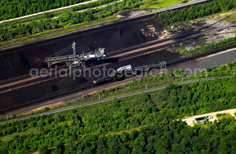 Aerial photograph Niederzier - Der Braunkohle- Tagebau Hambach (in den Gemeinden Niederzier, Kreis Düren und Elsdorf, Rhein-Erft-Kreis) ist der größte von der RWE Power AG (ehemals Rheinbraun AG) zur Förderung von Braunkohle betriebene Tagebau. Hambach coal- mine in North Rhine-Westphalia