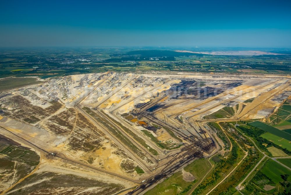 Aerial photograph Inden - Mining area - terrain and overburden surfaces of coal - opencast mining near Inden in the state North Rhine-Westphalia