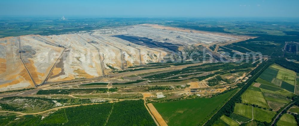 Aerial image Niederzier - Mining area - terrain and overburden surfaces of coal - opencast mining in Niederzier in the state North Rhine-Westphalia