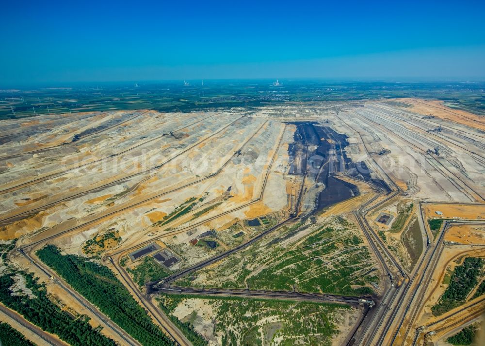 Niederzier from above - Mining area - terrain and overburden surfaces of coal - opencast mining in Niederzier in the state North Rhine-Westphalia