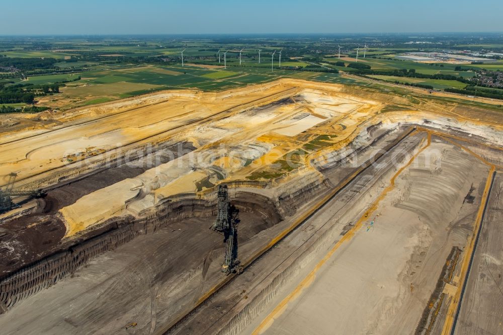 Aerial image Jüchen - Mining area - terrain and overburden surfaces of coal - opencast mining of RWE Power in Juechen in the state North Rhine-Westphalia