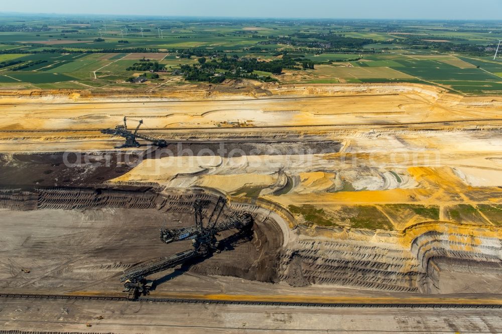 Aerial photograph Jüchen - Mining area - terrain and overburden surfaces of coal - opencast mining of RWE Power in Juechen in the state North Rhine-Westphalia