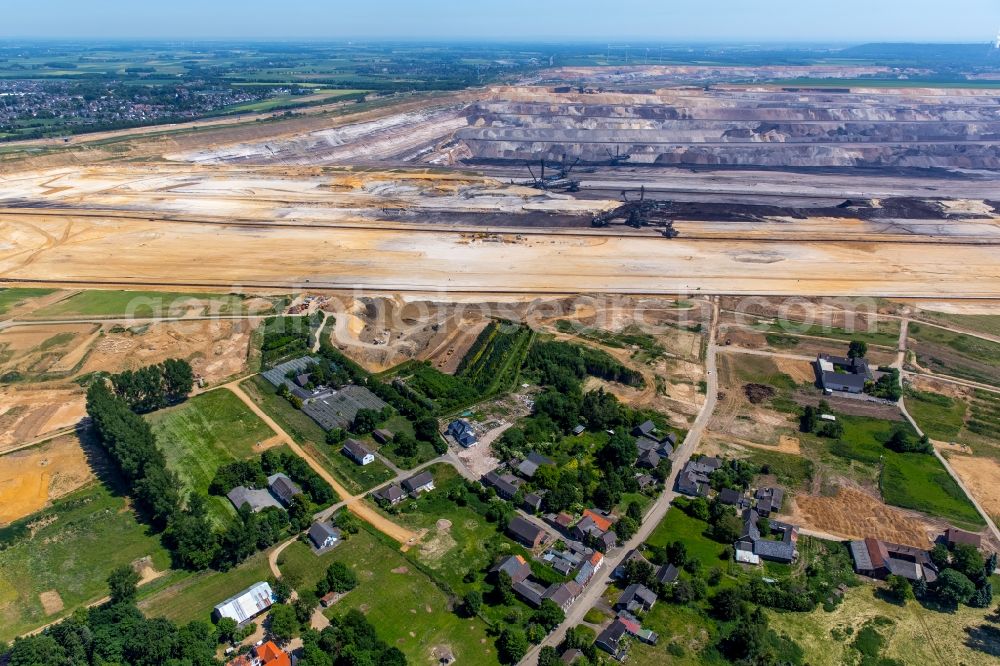 Jüchen from above - Mining area - terrain and overburden surfaces of coal - opencast mining of RWE Power in Juechen in the state North Rhine-Westphalia