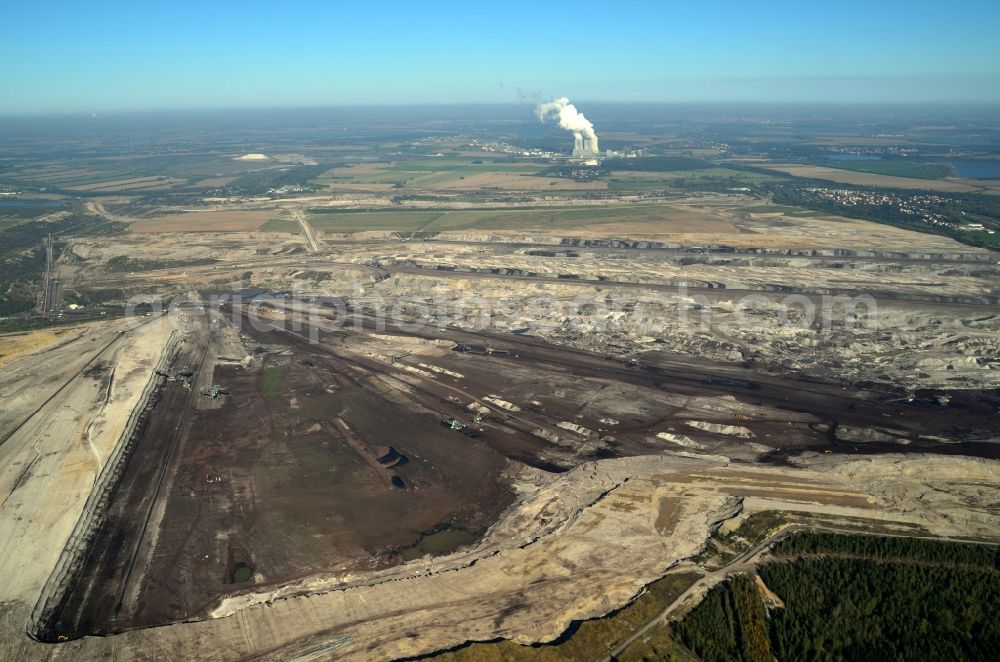 Deutzen from the bird's eye view: Schleenhain coal- mine in the state of saxony. In the background the power station Lippendorf