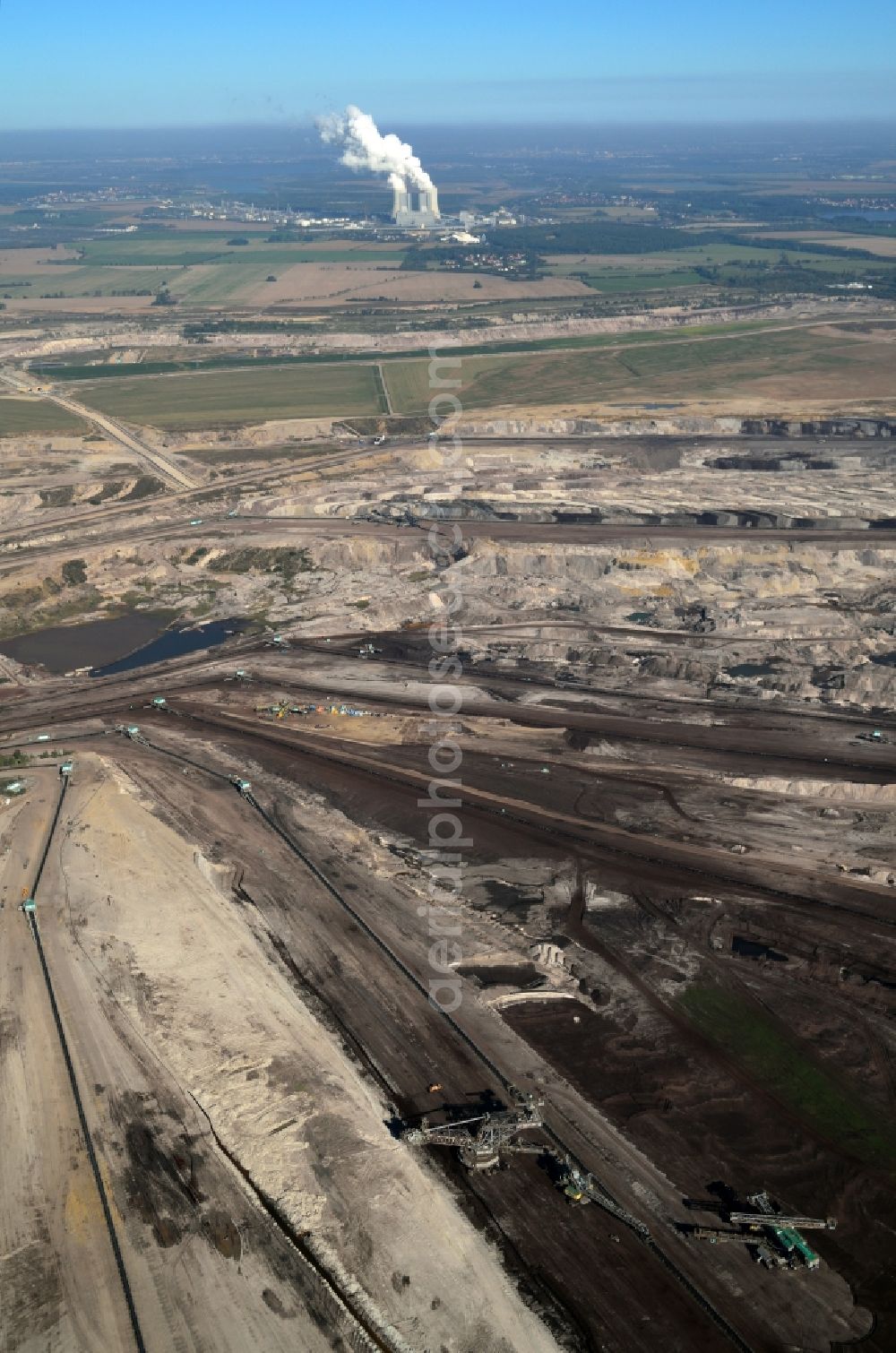 Aerial image Deutzen - Schleenhain coal- mine in the state of saxony. In the background the power station Lippendorf