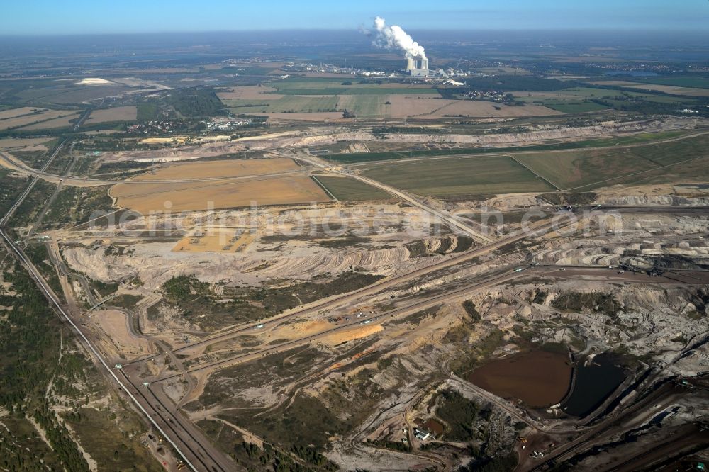 Aerial photograph Deutzen - Schleenhain coal- mine in the state of saxony. In the background the power station Lippendorf