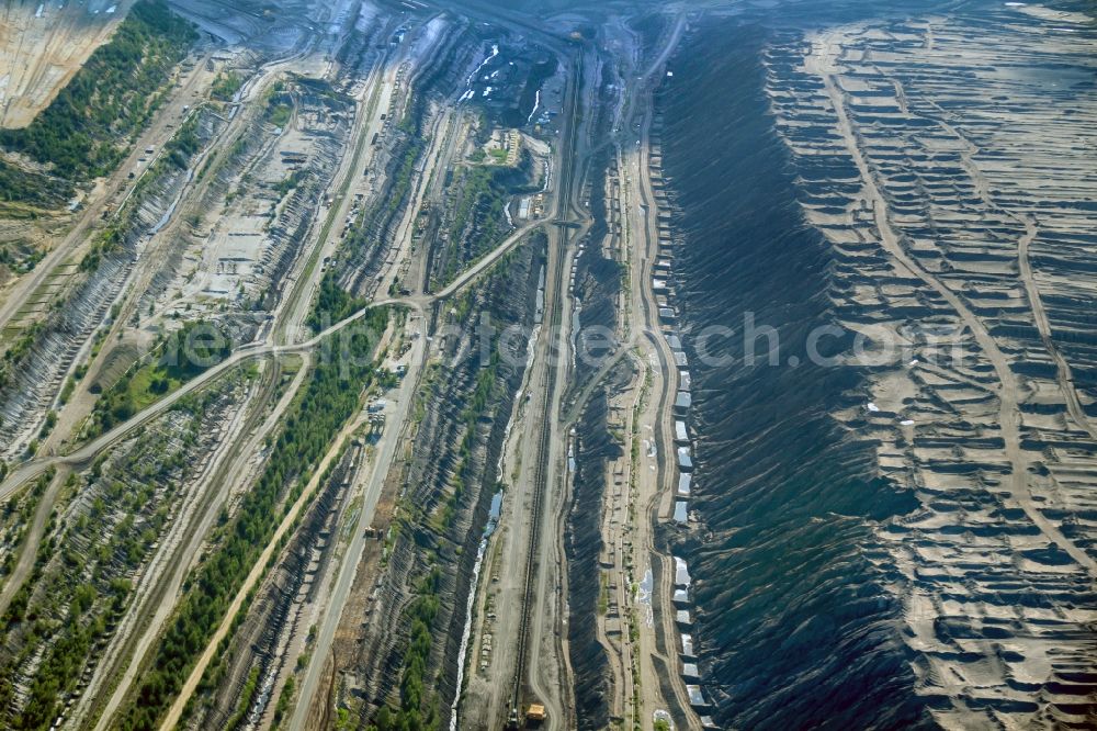 Aerial image Welzow - Mining area - terrain and overburden surfaces of coal - opencast mining of Vattenfall Europe in Welzow in the state Brandenburg