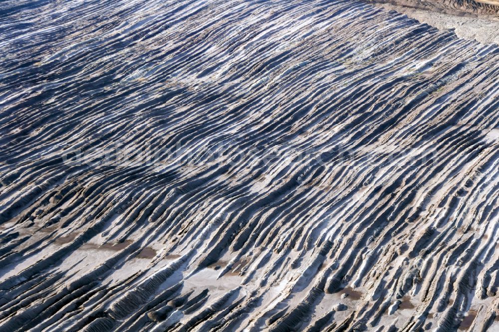 Spremberg from the bird's eye view: Mining area - terrain and overburden surfaces of coal - opencast mining Spremberg in Spremberg in the state Brandenburg