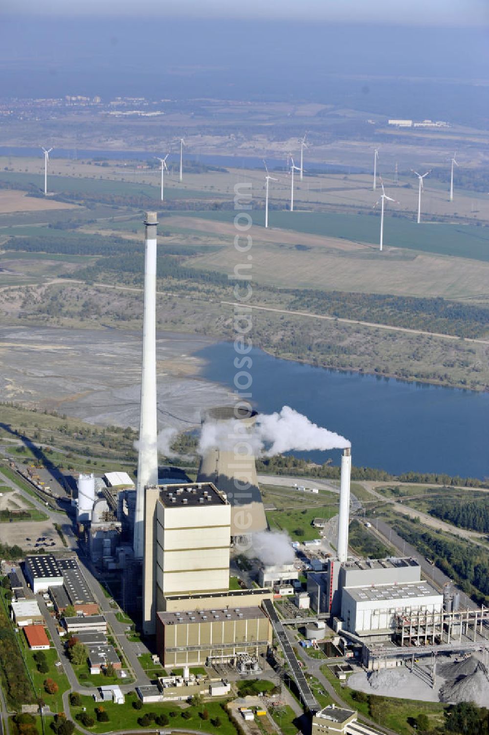 Aerial photograph Büddenstedt - Blick auf das Braunkohlekraftwerk Buschhaus bei Büddenstedt in Niedersachsen. Das Heizkraftwerk wurde 1985 in Betrieb genommen und wird von der E.ON Kraftwerke GmbH betrieben.View to the brown coal power station Buschhaus near Büddenstedt in Niedersachsen.The combined heat and power station was put into operation in 1985 and is managed by the E.ON Kraftwerke GmbH.