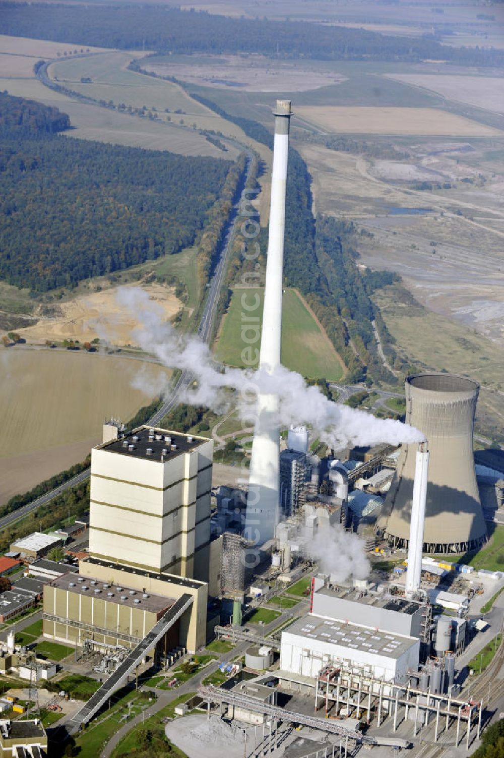 Aerial photograph Büddenstedt - Blick auf das Braunkohlekraftwerk Buschhaus bei Büddenstedt in Niedersachsen. Das Heizkraftwerk wurde 1985 in Betrieb genommen und wird von der E.ON Kraftwerke GmbH betrieben.View to the brown coal power station Buschhaus near Büddenstedt in Niedersachsen.The combined heat and power station was put into operation in 1985 and is managed by the E.ON Kraftwerke GmbH.