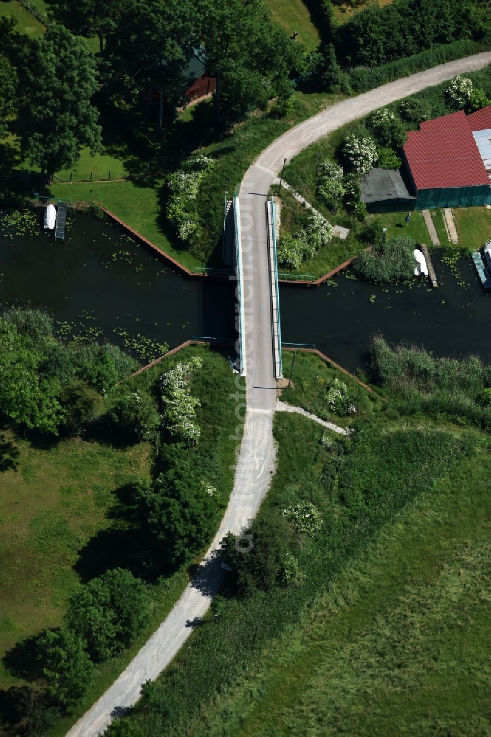 Genthin from above - Bridge across the Altenplathower Altkanal canal in the Altenplathow borough of Genthin in the state of Saxony-Anhalt