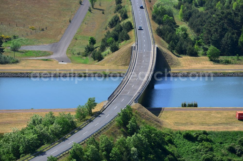 Hohenwarthe from above - Bridge over the Elbe-Havel canal and county road L52 in Hohenwarthe in the state Saxony-Anhalt. The bridge is located in the East of Hohenwarthe, a part of the Moeser borough in the county district of Jerichower Land. View from the North