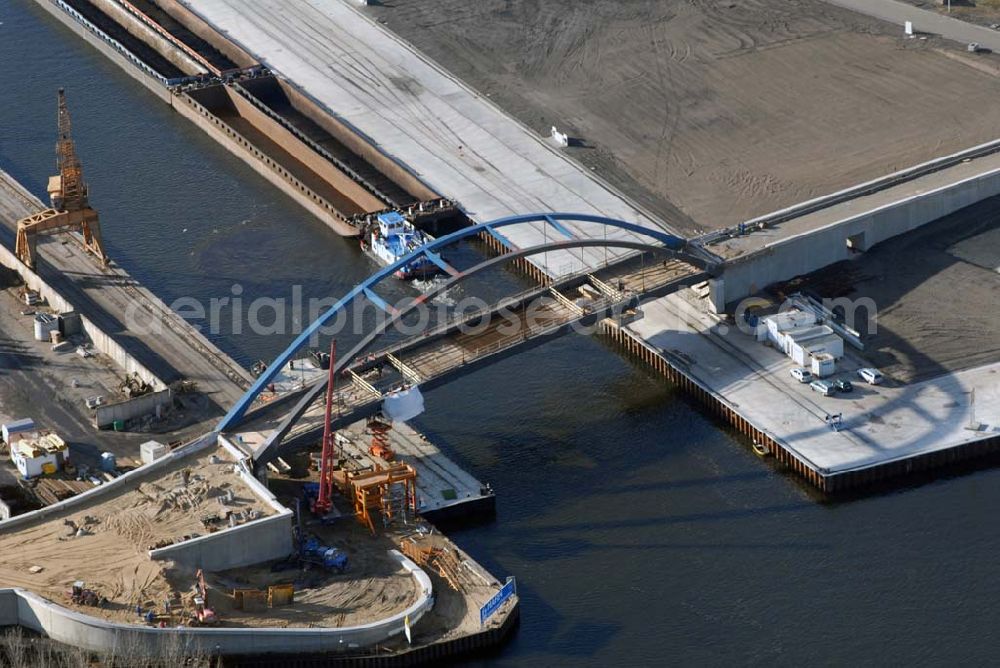 Aerial photograph Königs Wusterhausen - Blick auf die Brücke über den Nottekanal am Binnenhafen Königs Wusterhausen. Der Nottekanal ist schiffbar und hat drei Schleusen. Zwischen dem Bahnhof KW und der Dahme ist der Nottekanal zum Binnenhafen ausgebaut. Baufirma: Bateg Ingenieurbau GmbH, Herr Richter (0163/3002971), Heerstr. 16, 14052 Berlin Tel. +49 (30) 301 293 - 0 - Fax +49 (30) 301 293 - 40 - E-mail: info@bateg.de