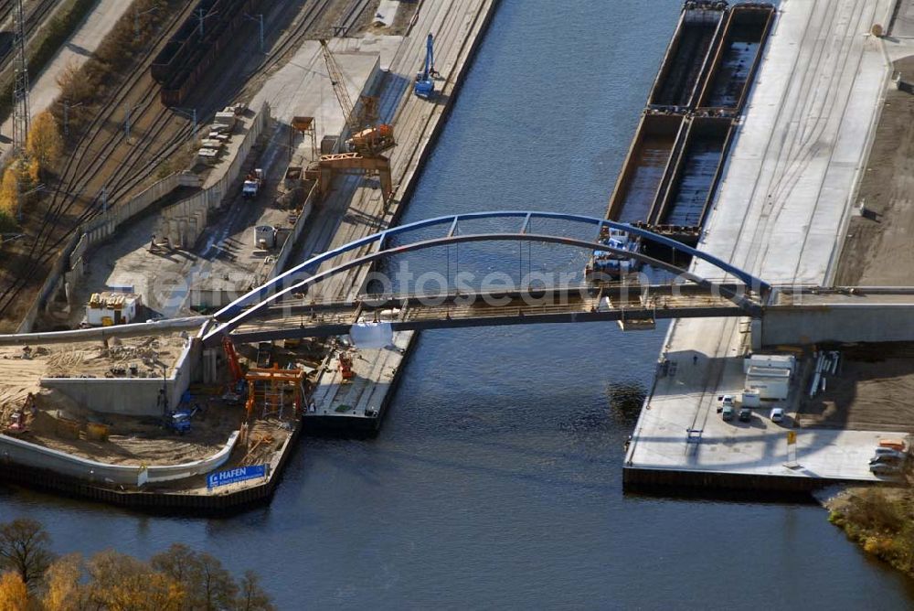 Königs Wusterhausen from the bird's eye view: Blick auf die Brücke über den Nottekanal am Binnenhafen Königs Wusterhausen. Der Nottekanal ist schiffbar und hat drei Schleusen. Zwischen dem Bahnhof KW und der Dahme ist der Nottekanal zum Binnenhafen ausgebaut. Baufirma: Bateg Ingenieurbau GmbH, Herr Richter (0163/3002971), Heerstr. 16, 14052 Berlin Tel. +49 (30) 301 293 - 0 - Fax +49 (30) 301 293 - 40 - E-mail: info@bateg.de