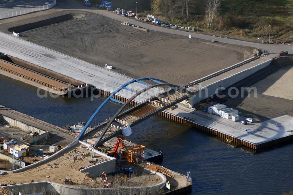 Königs Wusterhausen from the bird's eye view: Blick auf die Brücke über den Nottekanal am Binnenhafen Königs Wusterhausen. Der Nottekanal ist schiffbar und hat drei Schleusen. Zwischen dem Bahnhof KW und der Dahme ist der Nottekanal zum Binnenhafen ausgebaut. Baufirma: Bateg Ingenieurbau GmbH, Herr Richter (0163/3002971), Heerstr. 16, 14052 Berlin Tel. +49 (30) 301 293 - 0 - Fax +49 (30) 301 293 - 40 - E-mail: info@bateg.de