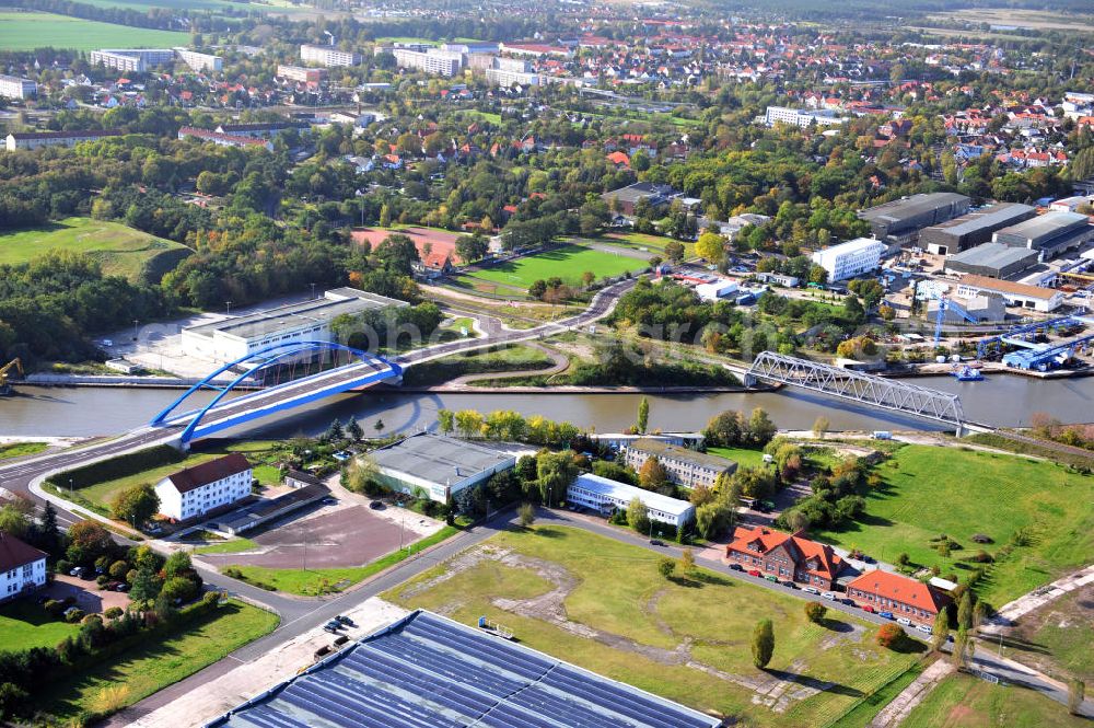 Genthin from the bird's eye view: Blick auf die Friedensbrücke / Brücke des Friedens B16 (l) und die Eisenbahnbrücke Genthin-Jerichow B15 (r) über den Elbe-Havel-Kanal in Sachsen-Anhalt. Ein Projekt des WSV, Wasser- und Schifffahrtsverwaltung des Bundes. Bridges over the Elbe-Havel-Canal in Saxony-Anhalt.