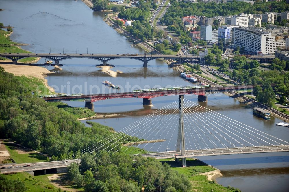 Aerial image Warschau / Warszawa - The cable-stayed bridge with names Swietokrzyski bridge or Holy Cross Bridge, a railway bridge and the Poniatowski bridge leading over the Vistula River in Warsaw in the Voivodeship Masovian in Poland