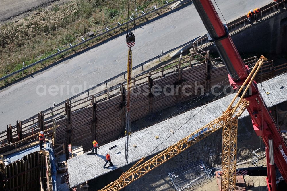 Aerial image Dittersdorf - Buildings and route of the motorway A9 motorway with four lanes now. Currently, reconstruction, expansion and new construction work is underway for the six-lane expansion of Highway 9 between Triptis and Schleiz by Wayss & Freytag Ingenieurbau and EUROVIA VINCI