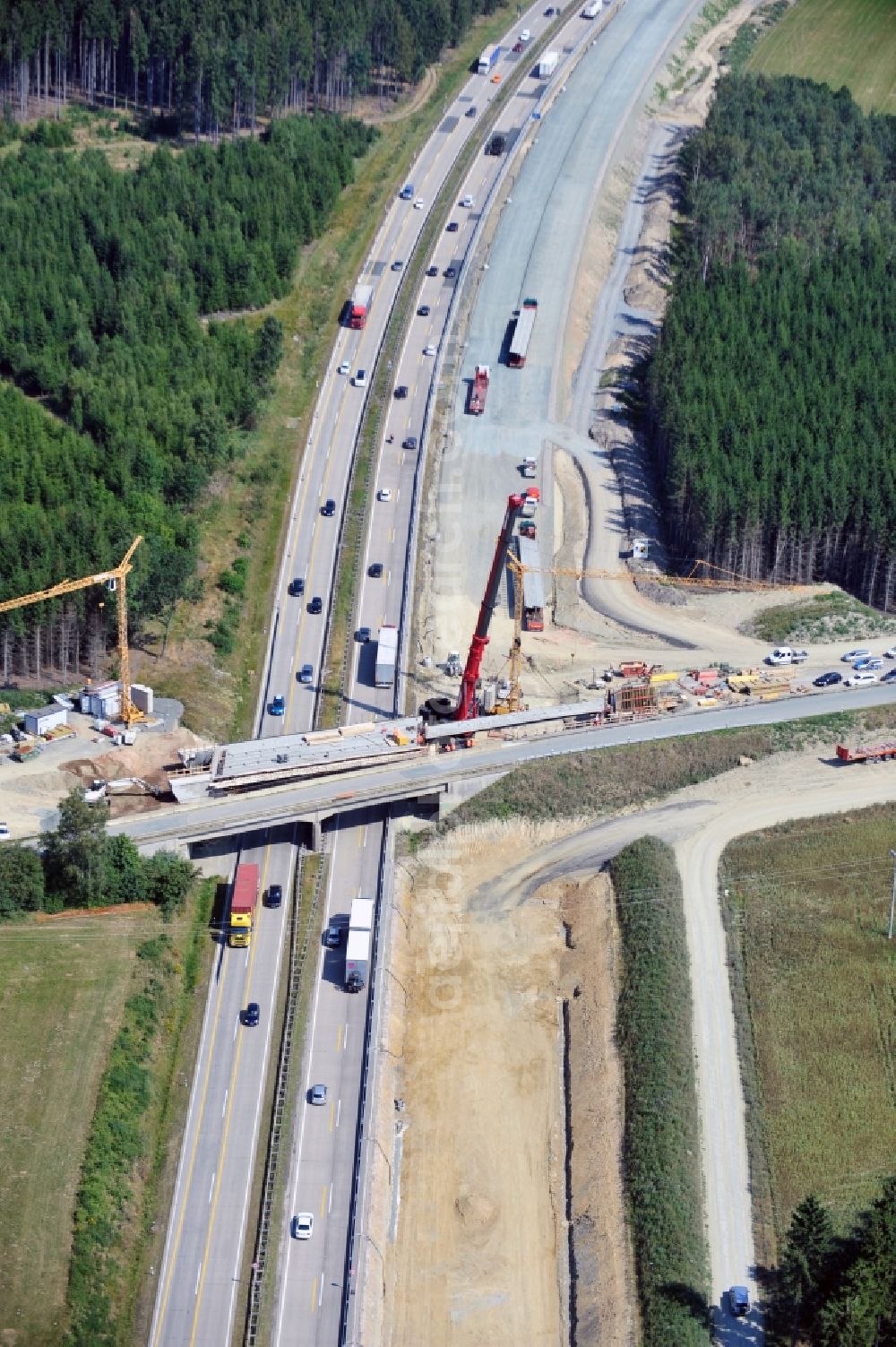 Aerial photograph Dittersdorf - Buildings and route of the motorway A9 motorway with four lanes now. Currently, reconstruction, expansion and new construction work is underway for the six-lane expansion of Highway 9 between Triptis and Schleiz by Wayss & Freytag Ingenieurbau and EUROVIA VINCI