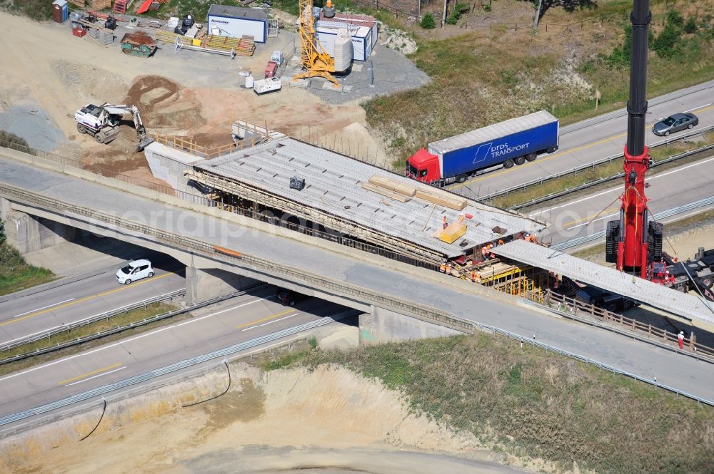 Dittersdorf from above - Buildings and route of the motorway A9 motorway with four lanes now. Currently, reconstruction, expansion and new construction work is underway for the six-lane expansion of Highway 9 between Triptis and Schleiz by Wayss & Freytag Ingenieurbau and EUROVIA VINCI