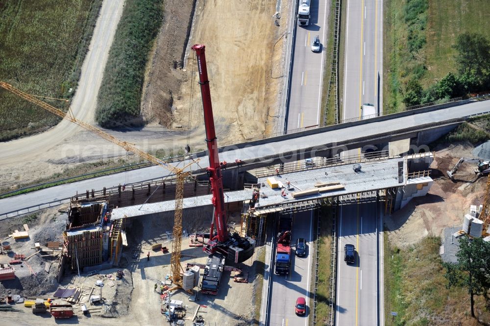 Aerial photograph Dittersdorf - Buildings and route of the motorway A9 motorway with four lanes now. Currently, reconstruction, expansion and new construction work is underway for the six-lane expansion of Highway 9 between Triptis and Schleiz by Wayss & Freytag Ingenieurbau and EUROVIA VINCI