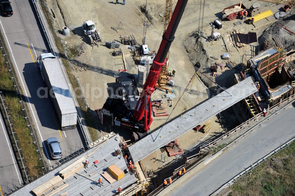 Aerial photograph Dittersdorf - Buildings and route of the motorway A9 motorway with four lanes now. Currently, reconstruction, expansion and new construction work is underway for the six-lane expansion of Highway 9 between Triptis and Schleiz by Wayss & Freytag Ingenieurbau and EUROVIA VINCI