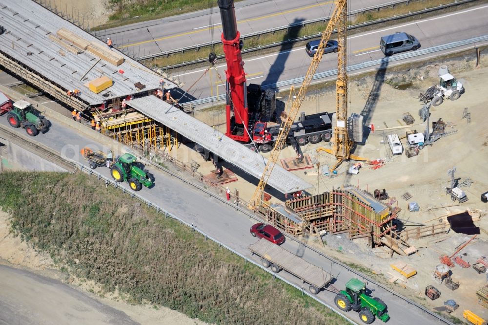 Dittersdorf from above - Buildings and route of the motorway A9 motorway with four lanes now. Currently, reconstruction, expansion and new construction work is underway for the six-lane expansion of Highway 9 between Triptis and Schleiz by Wayss & Freytag Ingenieurbau and EUROVIA VINCI