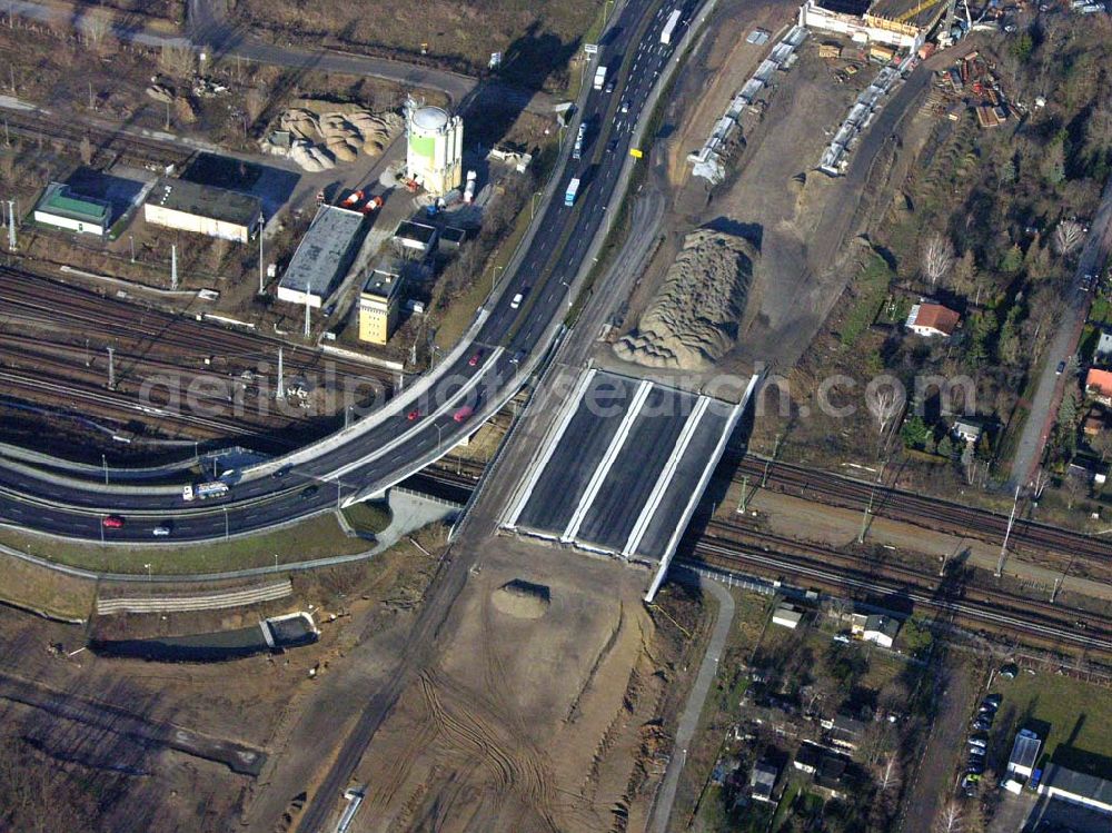 Schönefeld from the bird's eye view: Blick auf die fertig gestellte Zufahrtsbrücke am Stadtautobahnzubringer am S-Bahnhof Berlin-Schönefeld. Ein Projekt der Schälerbau Berlin GmbH.