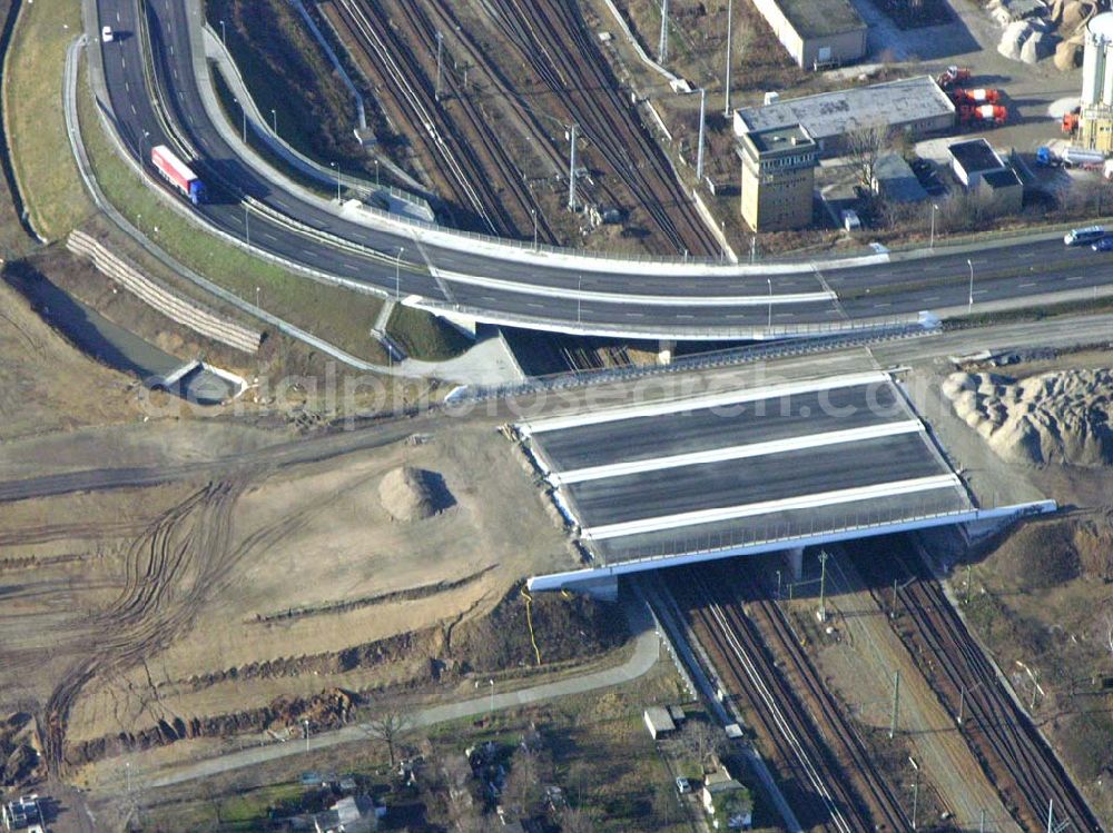 Schönefeld from the bird's eye view: Blick auf die fertig gestellte Zufahrtsbrücke am Stadtautobahnzubringer am S-Bahnhof Berlin-Schönefeld. Ein Projekt der Schälerbau Berlin GmbH.