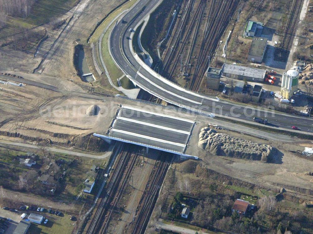 Schönefeld from the bird's eye view: Blick auf die fertig gestellte Zufahrtsbrücke am Stadtautobahnzubringer am S-Bahnhof Berlin-Schönefeld. Ein Projekt der Schälerbau Berlin GmbH.