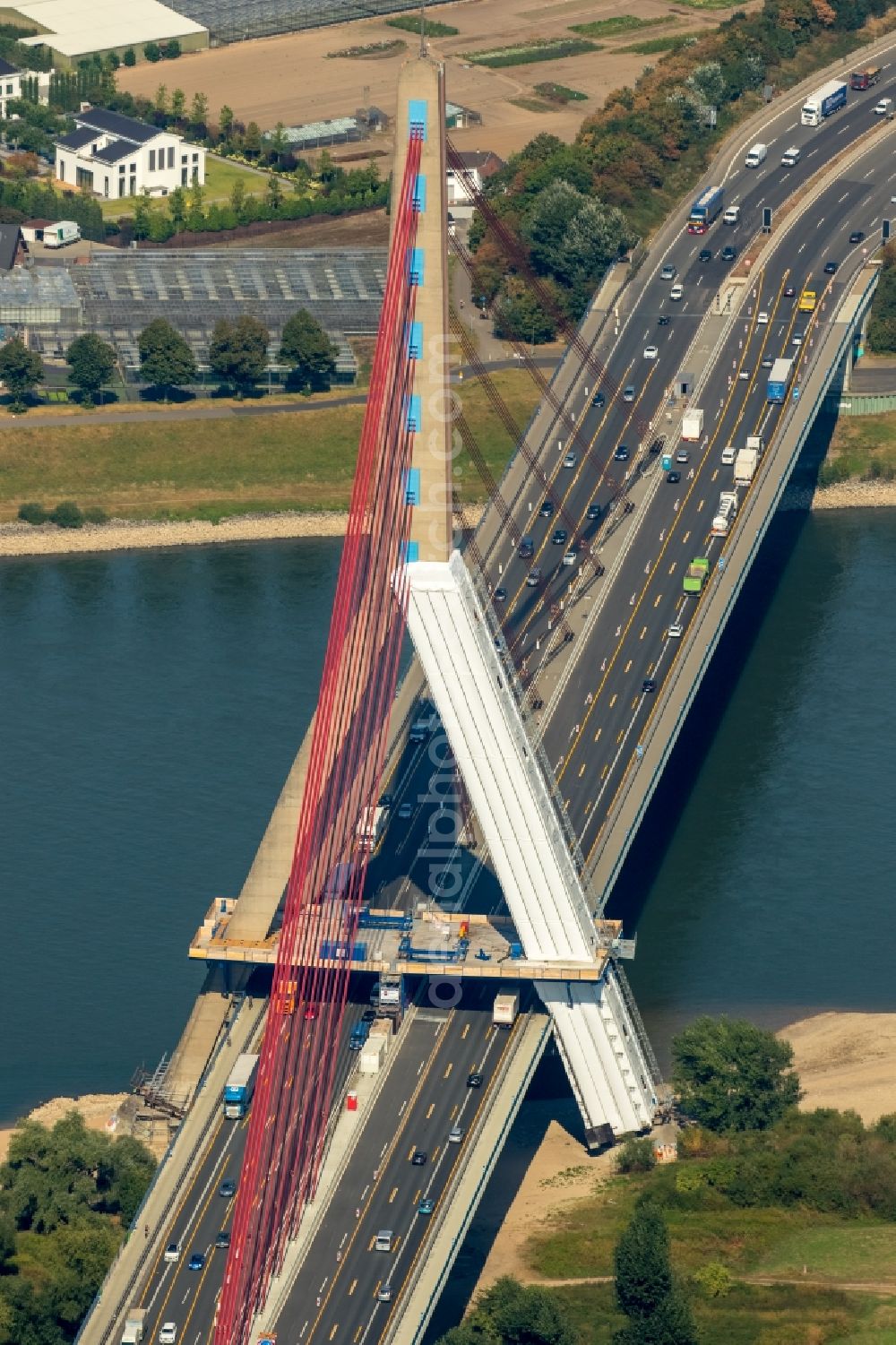 Neuss from above - Road bridge construction over the Rhein in Neuss in the state North Rhine-Westphalia. The Fleher Bruecke connects the right and left areas of the Rhein