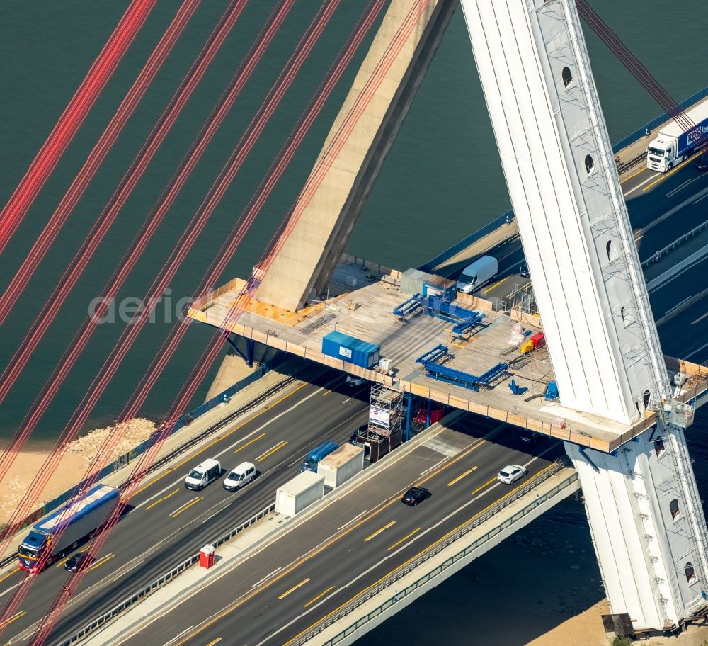 Neuss from the bird's eye view: Road bridge construction over the Rhein in Neuss in the state North Rhine-Westphalia. The Fleher Bruecke connects the right and left areas of the Rhein