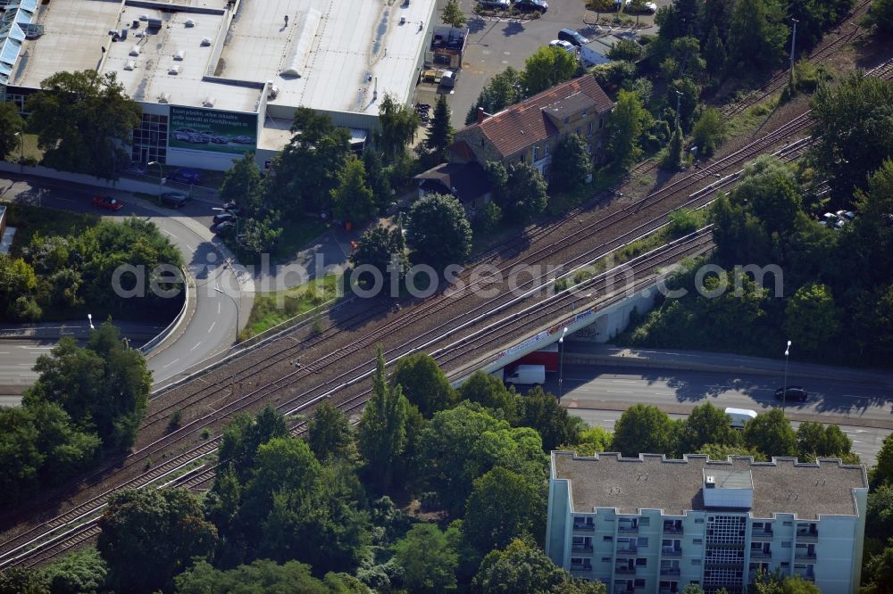 Berlin from the bird's eye view: Bridge structure at the federal road B101 / Marie Allee - Großbeerenstraße along the railway line to the station Marienfelde in Berlin