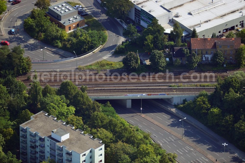 Aerial image Berlin - Bridge structure at the federal road B101 / Marie Allee - Großbeerenstraße along the railway line to the station Marienfelde in Berlin