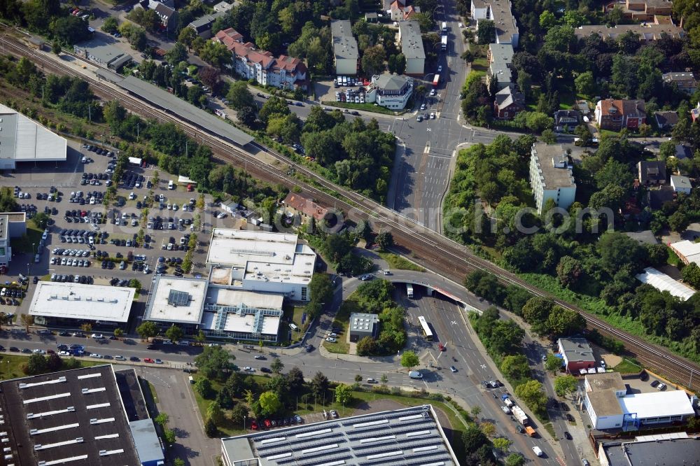 Berlin from the bird's eye view: Bridge structure at the federal road B101 / Marie Allee - Großbeerenstraße along the railway line to the station Marienfelde in Berlin