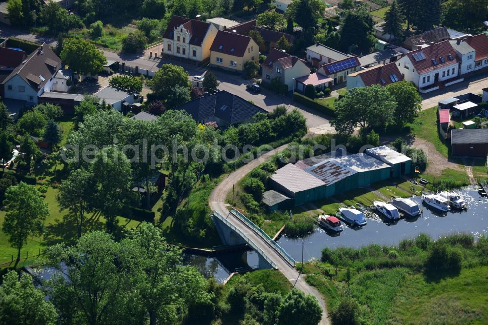 Genthin from the bird's eye view: Road bridge construction along the Banks of the connecting channel at Inselweg in Genthin in the state Saxony-Anhalt