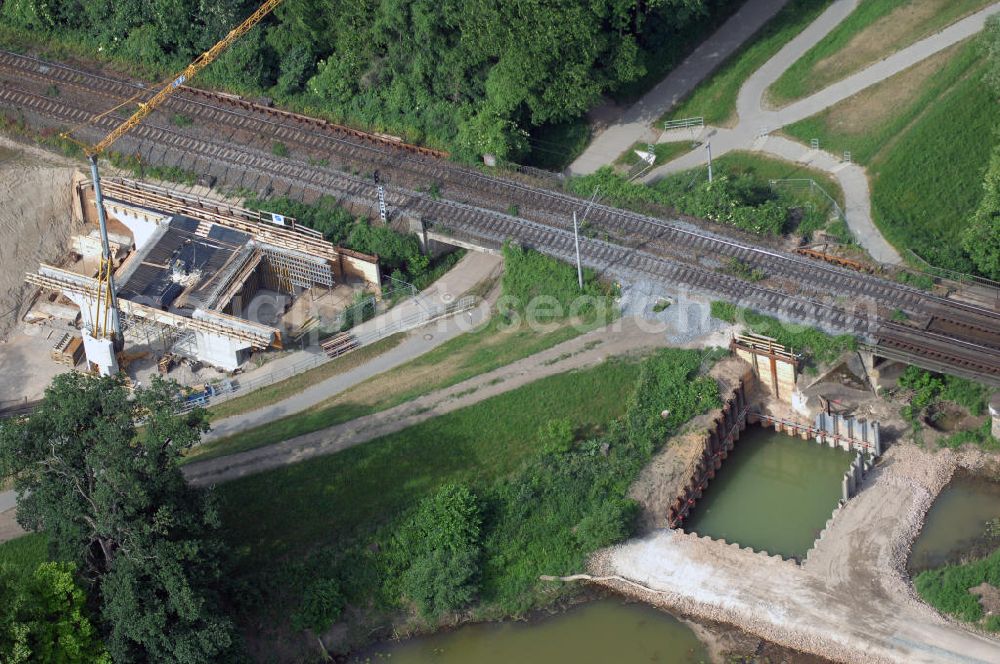 Aerial photograph Roßlau - Blick auf verschiedene Brückenbauwerke an der Baustelle zum Ausbau der B184 zwischen Dessau und Roßlau in Sachsen-Anhalt. Die B184 wird aufgrund des gestiegenen Verkehrsaufkommens 4-streifig über den Verlauf der Elbe hinweg ausgebaut. Bauherr ist der Landesbetrieb Bau Sachsen-Anhalt, die Projektleitung liegt bei SCHÜßLER - PLAN Berlin. Kontakt Projektleitung: Schüßler - Plan Ingenieurgesellschaft mbH, Greifswalder Straße 80A, 10405 Berlin, Tel. +49(0)30 42106 0, Fax +49(0)30 42106 301, Email: berlin@schuessler-plan.de