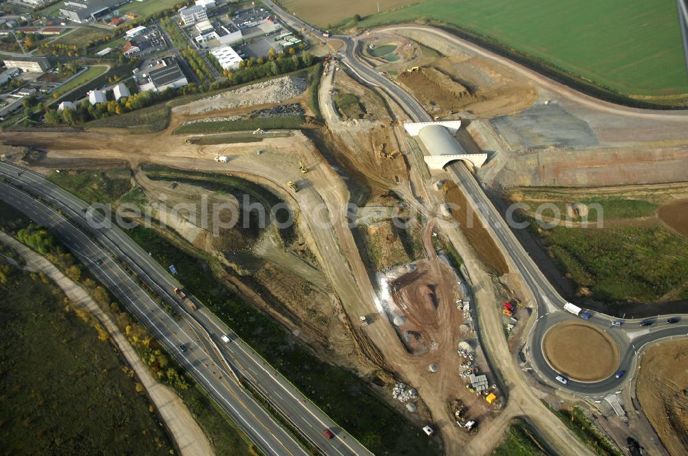 Aerial image Deubachshof - Baustellen an der Neubautrasse der BAB A 4 - Umfahrung Hörselberge in Thüringen bei Eisenach. Das Bieterkonsortium VINCI Concessions / Hochtief PPP (50/50) hat den Zuschlag für das A-Modell BAB A 4 Umfahrung Hörselberge (km 238,5 bis km 283,2) erhalten. Die bei diesem Projekt auf der Bauausführungsebene gegründete Arbeitsgemeinschaft wird von der EUROVIA Infra GmbH angeführt, des Weiteren sind hier die Unternehmen Hochtief, Strassing Limes und Rädlinger beteiligt. Durchgeführt werden die im Zuge dieses Projektes notwendigen Arbeiten unter an derem von den Mitarbeitern der Niederlassung Weimar der EUROVIA Verkehrsbau Union sowie der Niederlassungen Abbruch und Erdbau, Betonstraßenbau, Ingenieurbau und TECO Schallschutz der EUROVIA Beton. DEGES; STREIF Baulogistik