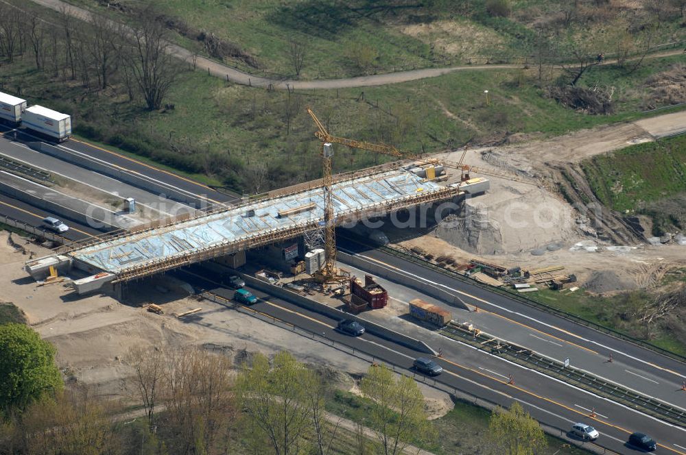 Aerial photograph Berlin - Blick auf die Baustelle vom Neubau der Brücke über die Autobahn A 10 an der Bucher Straße und Hobrechtsfelder Chaussee. Ein Projekt von EUROVIA. View onto the construction site of the new build bridge over the highway A10.