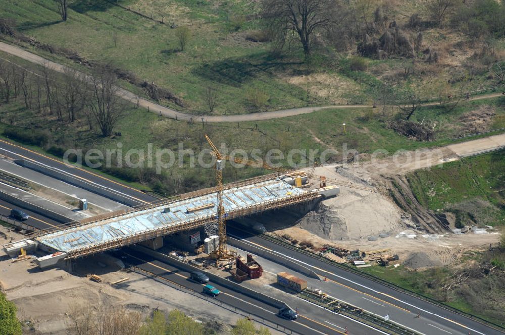 Berlin from above - Blick auf die Baustelle vom Neubau der Brücke über die Autobahn A 10 an der Bucher Straße und Hobrechtsfelder Chaussee. Ein Projekt von EUROVIA. View onto the construction site of the new build bridge over the highway A10.