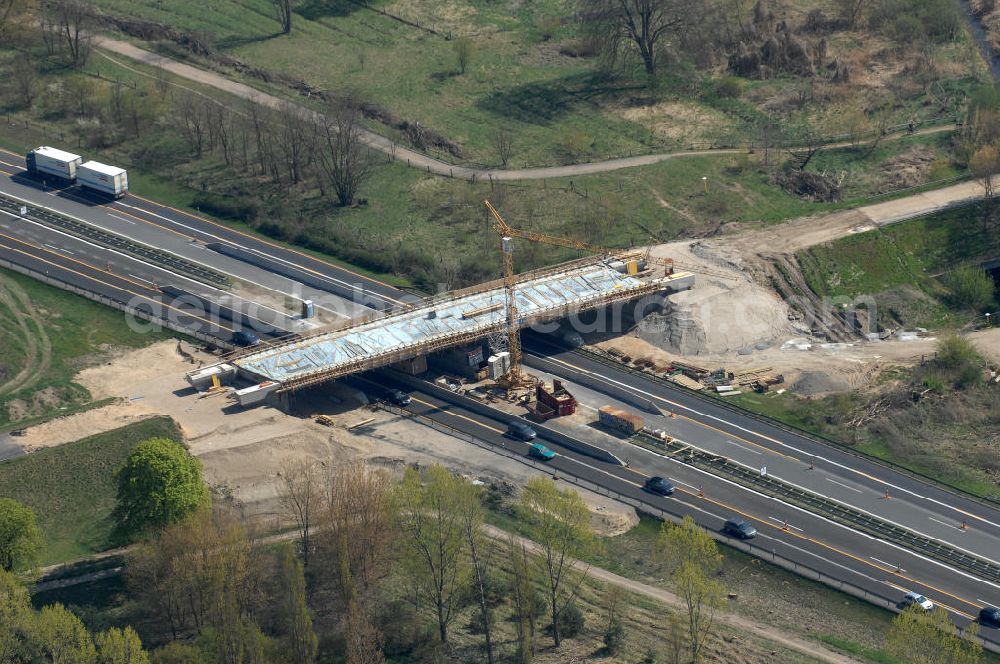 Berlin from the bird's eye view: Blick auf die Baustelle vom Neubau der Brücke über die Autobahn A 10 an der Bucher Straße und Hobrechtsfelder Chaussee. Ein Projekt von EUROVIA. View onto the construction site of the new build bridge over the highway A10.