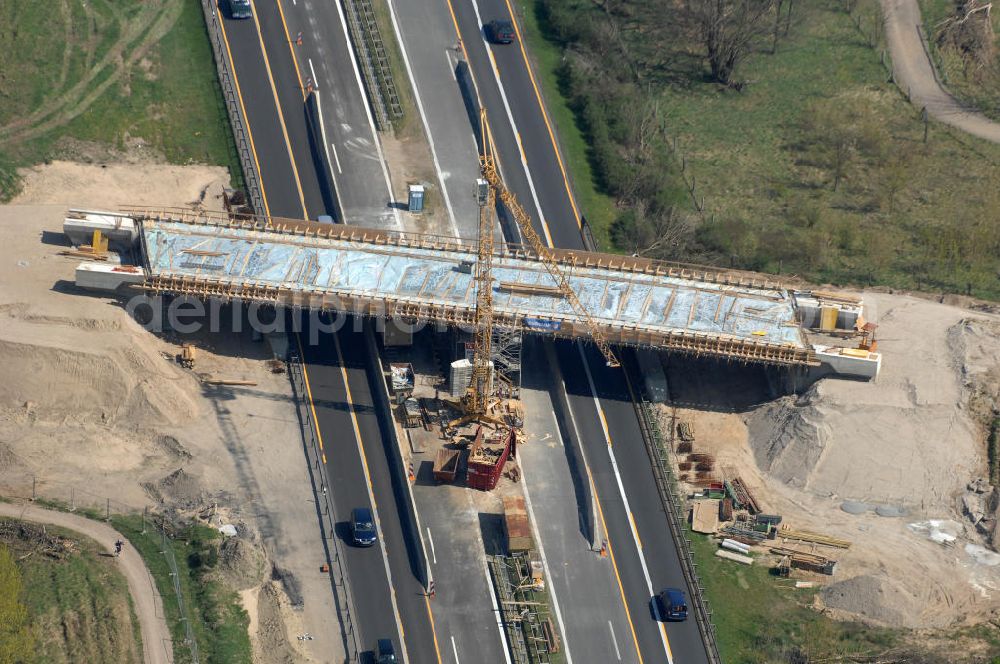 Aerial photograph Berlin - Blick auf die Baustelle vom Neubau der Brücke über die Autobahn A 10 an der Bucher Straße und Hobrechtsfelder Chaussee. Ein Projekt von EUROVIA. View onto the construction site of the new build bridge over the highway A10.