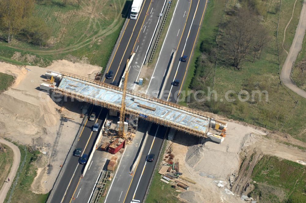 Aerial photograph Berlin - Blick auf die Baustelle vom Neubau der Brücke über die Autobahn A 10 an der Bucher Straße und Hobrechtsfelder Chaussee. Ein Projekt von EUROVIA. View onto the construction site of the new build bridge over the highway A10.