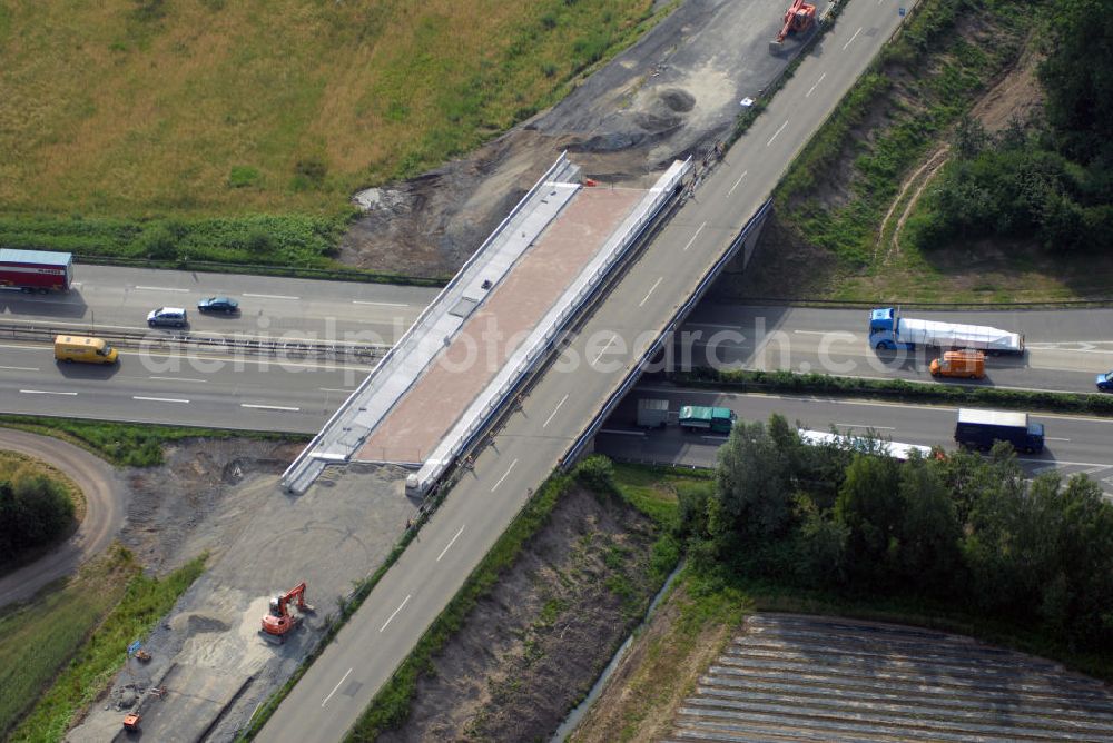 Appenweier / OT Urloffen from above - Blick auf den Brückenneubau an der A5 nahe Urloffen. Die A5 ist Teil der HaFraBa (Hamburg Frankfurt Basel) vom Hattenbacher Dreieck bis an die Grenze zur Schweiz. Verbindungen u.a. zum französischen Autobahnnetz und zur Verbindung Holland - Österreich. Wegen dem geplanten sechsspurigen Ausbau zwischen Baden-Baden und Offenburg musste eine längere Brücke gebaut werden und die alte Brücke weichen. Die Arbeiten wurden durch Joos Umwelttechnik ausgeführt. Kontakt: Joos, Umwelttechnik GmbH, Industriestrasse 1, 79258 Hartheim, Tel.: 07633/4007-60,