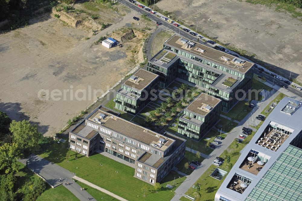 Bonn from the bird's eye view: Der Büro-Campus Rheinwerk II im Bonner Bogen im Stadtteil Ramersdorf. Der Bonner Bogen befindet sich am Rheinufer auf dem Gelände einer ehemaligen Zementfabrik. Bauherr war die BonnVisio Real Estate GmbH & Co. KG. The office campus Rheinwerk II on the Bonn Arc in the district Ramersdorf. The Bonn Arch is located on the Rhine on the site of a former cement factory.